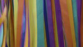 Colorful Satin Ribbons Swaying In The Gentle Breeze, Footage of colorful satin ribbons gently swaying in the breeze, perfect for lifestyle videos, commercial content, and artistic projects - Powered by Shutterstock - Get 15% off with code: PIKWIZARD15