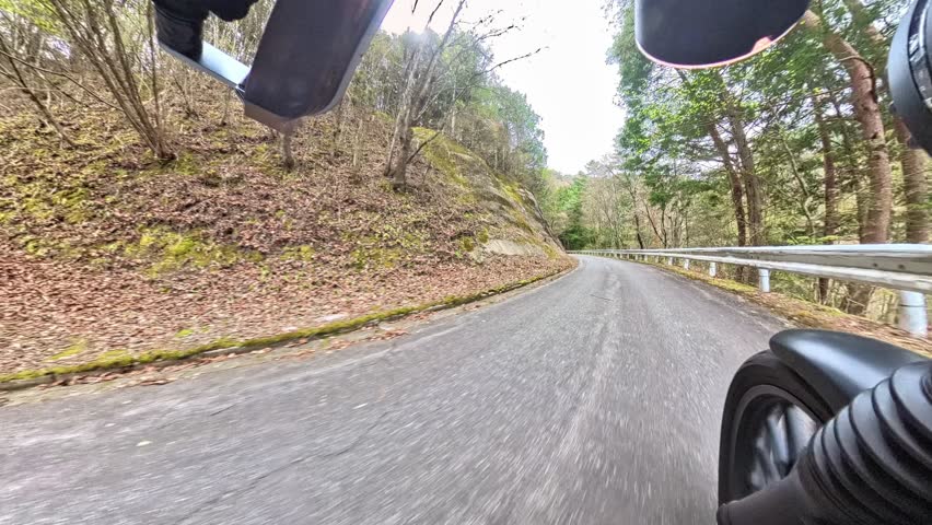 In-car footage of a motorcycle climbing the mountain road of Gokuraku Pass