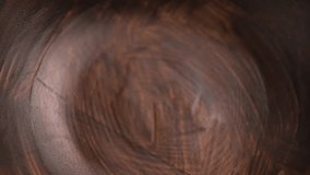 Dried shiitake mushrooms falling into a wooden brown bowl. Raw culinary ingredient. Slow motion - Powered by Shutterstock - Get 15% off with code: PIKWIZARD15