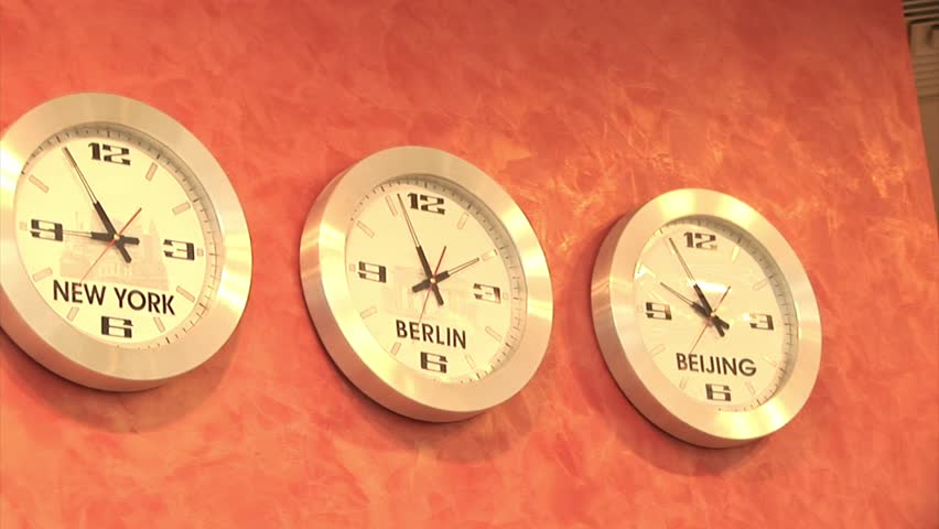 Time ZonesClock showing passing time in different time zones around the world.