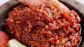 Homemade Sambal Terasi, Traditional Spicy Indonesian Chili Paste with Shrimp Paste and Fresh Red Chili - Powered by Shutterstock - Get 15% off with code: PIKWIZARD15