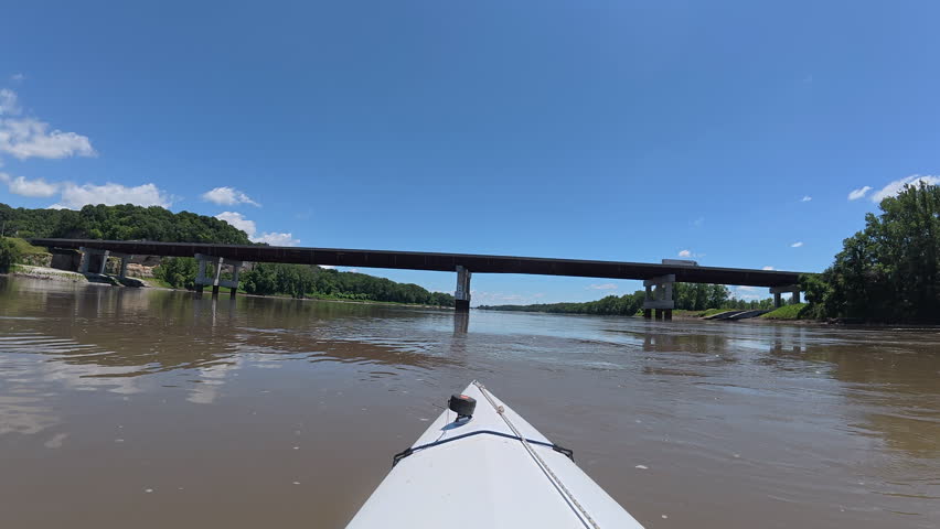 paddling on the Missouri River and approaching a new highway bridge at Rocheport, MO - POV from kayak or canoe