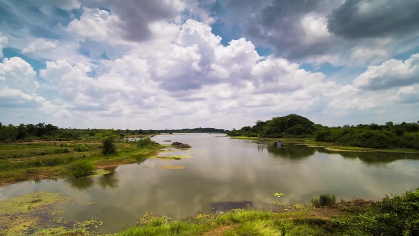 Beautiful landscape of the lake with reflection of the sky and clouds in the water