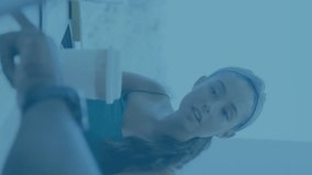 Animation of financial data processing over diverse business people using laptop. Global finance, business, connections, computing and data processing concept digitally generated video. - Powered by Shutterstock - Get 15% off with code: PIKWIZARD15