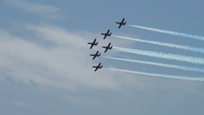 Air exhibition by the Aguila patrol, Spain's acrobatic team, in the waters of the Mar Menor, Murcia, Spain.