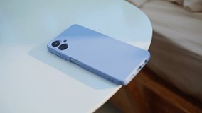 Woman hand taking mobile phone from bedside table closeup. Unrecognizable young lady looking at cellphone screen at wake up in bedroom. Unknown girl checking time on smartphone in light apartment. - Powered by Shutterstock - Get 15% off with code: PIKWIZARD15