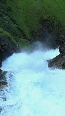 closeup of rushing river running down to waterfall, Norway, travel experience