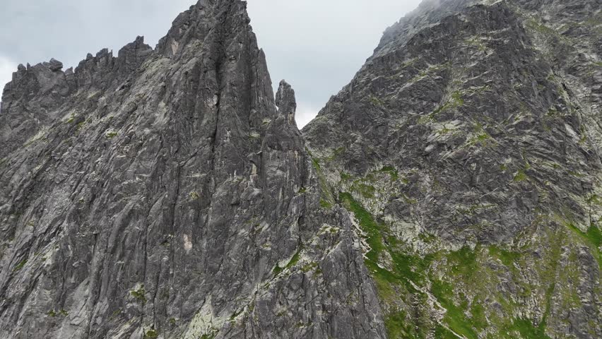 Aerial view of Sharp Granite Spires and Rugged Slopes of the High Mountains