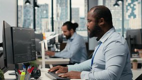 Trader frightened by security alert on PC after hacker uses exploit to penetrate systems. Brokerage company worker responds to cyberattack, protecting client account from unauthorized access, camera B - Powered by Shutterstock - Get 15% off with code: PIKWIZARD15