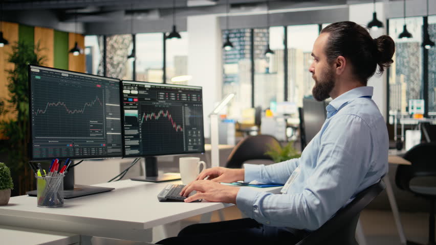 Portfolio manager analyzes market trends to refine investment strategies and enhance returns. Financial expert tracks performance metrics to identify new investment opportunities, camera A