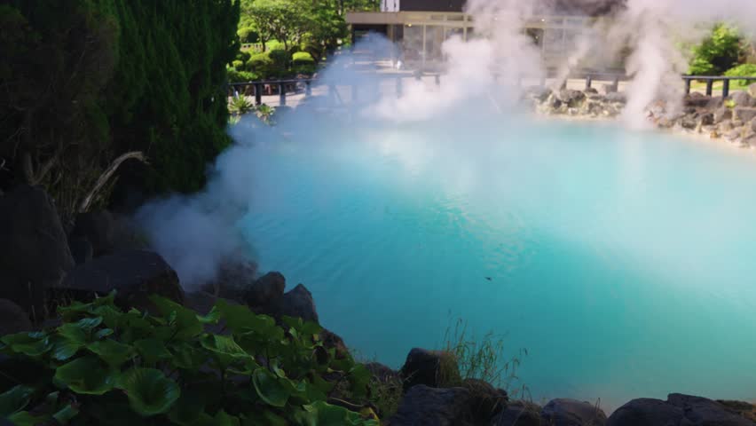 Bright Blue Pool of Boiling Geothermal Water, Beppu Hot Springs in Beppu Japan