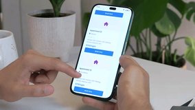 Detailed view of hands finalizing a hotel booking on a mobile device, symbolizing adventure, business travel, and anticipation. - Powered by Shutterstock - Get 15% off with code: PIKWIZARD15