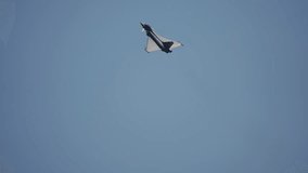 Fighter jet uses afterburners during a steep climbing maneuver in a clear sky - Powered by Shutterstock - Get 15% off with code: PIKWIZARD15