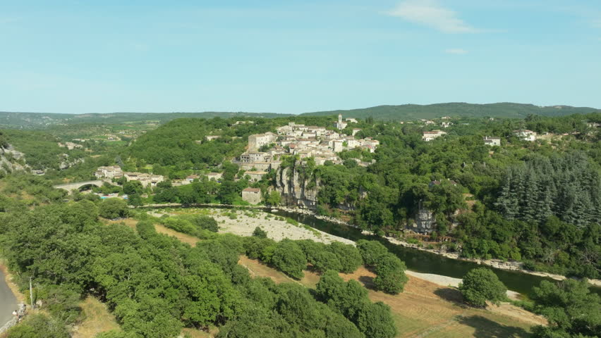 Aerial Approach to Balazuc Village on Cliff next Ardèche River