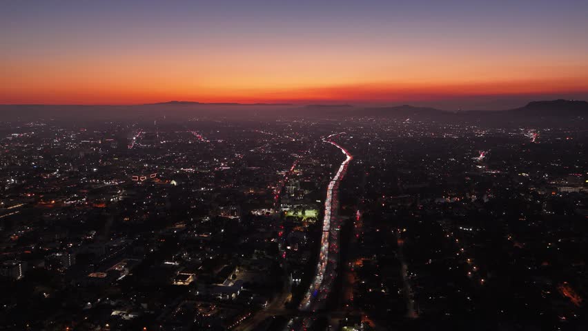 Drone aerial view of Los Angeles freeway at sunset, August 10, 2025
