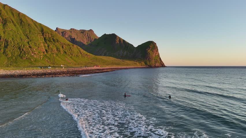 Aerial footage of Unstad, a remote surfing paradise in northern Norway’s Lofoten Islands. Nestled between high mountains and featuring pristine white sand beaches, far above the Arctic Circle.