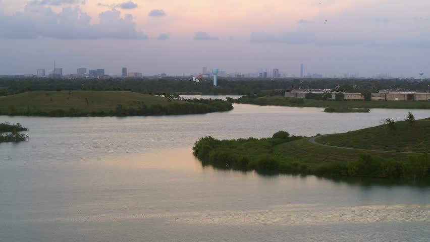 Scenic Aerial Shot of Bayou in Southwest Houston with City Skyline Beyond