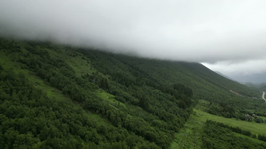Foggy Mountain and Valley Landscape in Norway from Drone