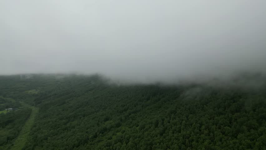Foggy Mountain and Valley Landscape in Norway from Drone