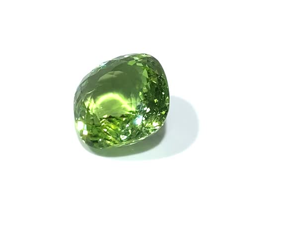 Beautiful Yellowish Green Paraiba Tourmaline Rotating on a White Background