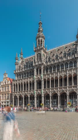 Timelapse hyperlapse of Maison du Roi (King's House) facade at Grand Place, Brussels, Belgium. Gothic-style tenement, former guild hall, now home to Brussels City Museum. UNESCO World Heritage Site