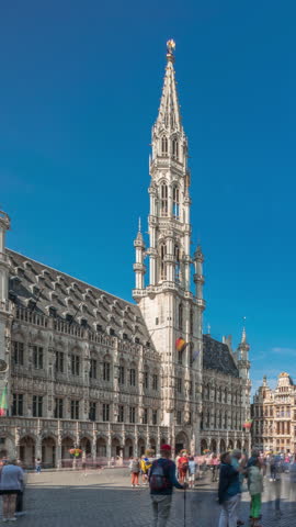 The Grand-Place (Grote Markt) timelapse hyperlapse in Brussels, Belgium. Brabantine Gothic Town Hall, Baroque guildhalls and bustling tourists in the historic city center. UNESCO World Heritage Site