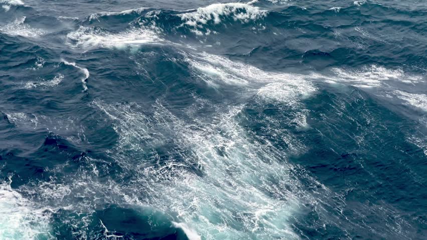 sea foam and turbulent seas off the alaska coast