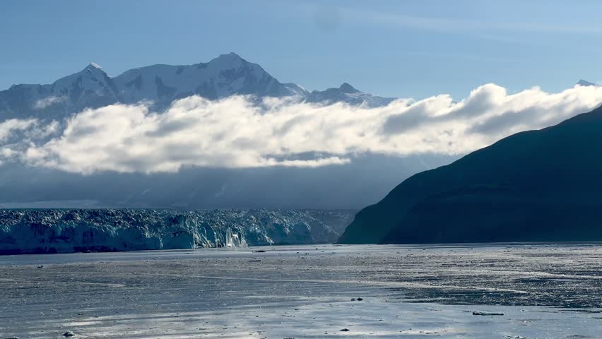 icy water and clouds at the hubbard glacier in alaska