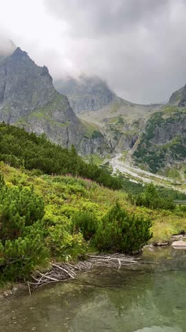 Scenic view of mountain lake and hut (Chata pri zelenom plese) in High Tatras, Slovakia. Zelene Pleso (Green lake) mountain lake in High Tatras, Slovakia
