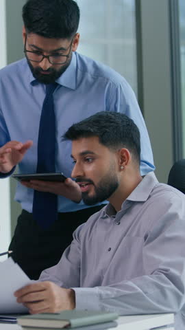 Business Arabian team Indian colleagues businessmen in office happy celebrating winning achieve discuss looking at computer happy celebrate work winning achieve financial growth success high five