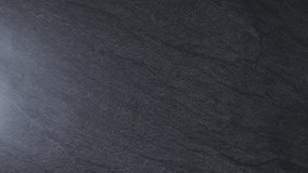 One unrecognizable young Caucasian girl puts cardboard box with pumpkin, carrot, apple, orange, onion, garlic, bouillon cubes and rosemary sprigs on black stone background,flat lay close-up in real ti - Powered by Shutterstock - Get 15% off with code: PIKWIZARD15