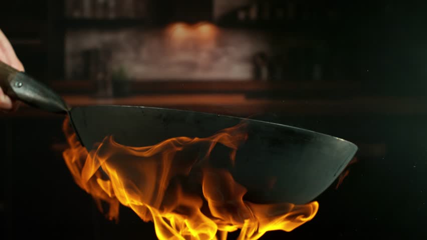 Super Slow Motion of Flying Asian Wok Ingredients . Filmed on High Speed Cinema Camera