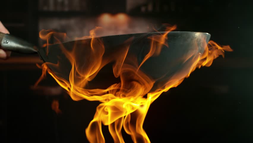 Super Slow Motion of Flying Asian Wok Ingredients . Filmed on High Speed Cinema Camera
