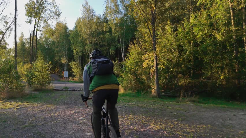 Morning Gravel Ride by Finnish Lake with Rising Mist and Sunrise

