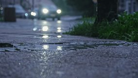 Car Lights Reflections on Wet Sidewalk Surface during Rainy Day - Powered by Shutterstock - Get 15% off with code: PIKWIZARD15
