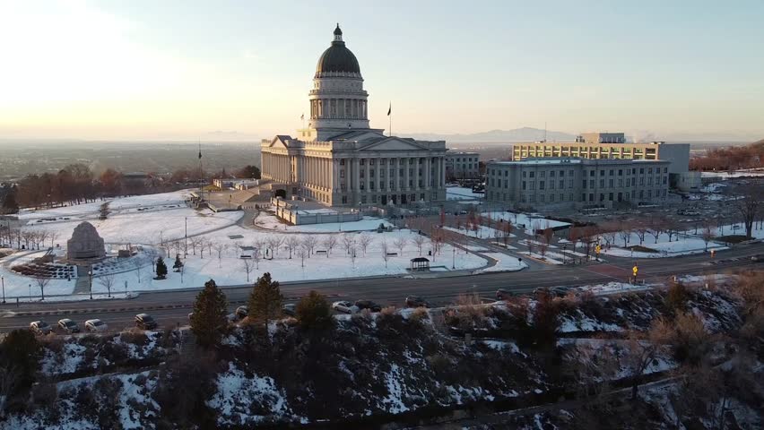 Aerial view of utah state capitol building covered with snow in salt lake city