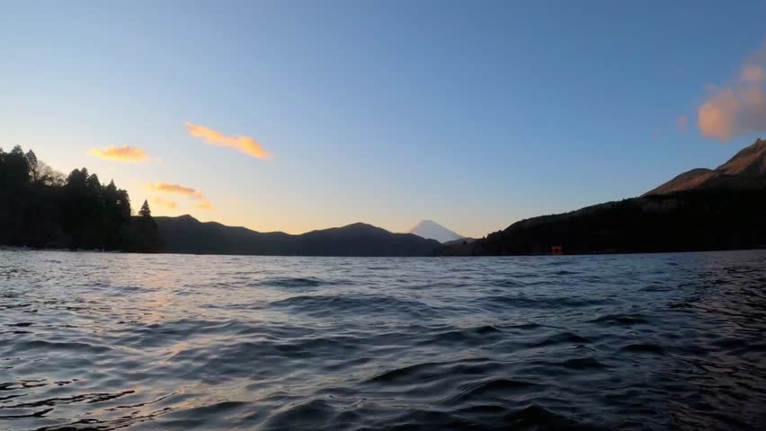 Lake and mountain landscape in japan at dusk, a tranquil and scenic view