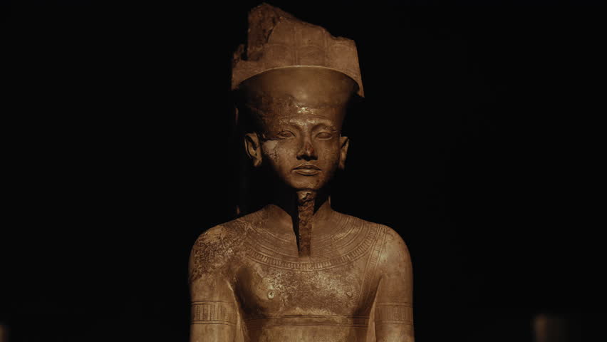 Cinematic shot of an ancient pharaoh bust statue in Cairo, Egypt. Detailed close-up capturing timeless history, archaeology, and cultural heritage of ancient Egypt’s dynasties. - Powered by Shutterstock - Get 15% off with code: PIKWIZARD15