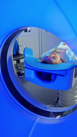 CT scanning of the spine examination for assess for herniated disk, tumors, extent of injuries, blood vessel malformations. Video computed tomography CT scan process for examination of spine.