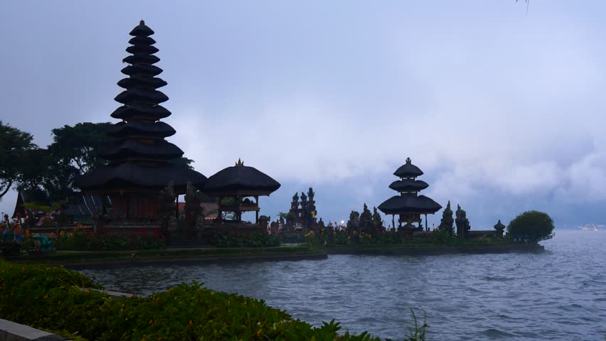 Bedugul Lake in Bali offers serene views, cool climate, and stunning natural mountain surroundings.