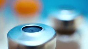 Nurse hand prepares syringe with medication from glass vial. Community health efforts support wellness. Promoting vaccinations while maintaining sterile and safe medical practices - Powered by Shutterstock - Get 15% off with code: PIKWIZARD15
