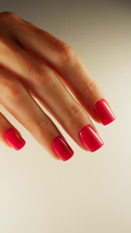 Well-groomed female hand after manicure with nail plate coating. High quality 4k footage