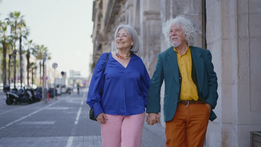 Cheerful elderly couple sharing tender moment during scenic seaside vacation, radiating genuine love, joy, and deep emotional connection in golden years