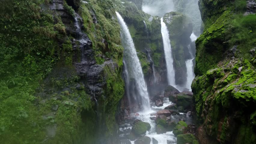 A stunning close-up of the multi-tiered waterfalls at Quebrada Gata in Costa Rica.