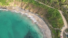 Drone footage of Praia do Meio in Fernando de Noronha, highlighting rocky coastline, turquoise waters and natural beauty, perfect for travel, tourism and landscape stock video. - Powered by Shutterstock - Get 15% off with code: PIKWIZARD15