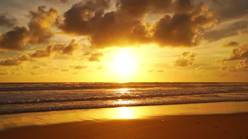 Beautiful sea sunrise or sunset sky over sea.Amazing sky and shining golden waves landscape,Beautiful waves crashing on sandy shore,Beach Sea sky nature background