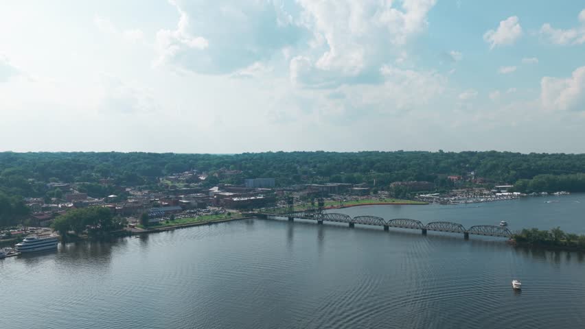 Aerial super wide shot of downtown Stillwater on the St. Croix River in Minnesota. 4K