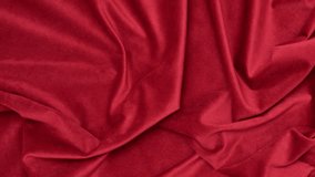 Red velvet fabric texture with soft folds. Red fabric background of soft and smooth textile material. Fabric texture for design and decoration. Top view. - Powered by Shutterstock - Get 15% off with code: PIKWIZARD15