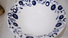 Cracking Eggs into Plate, Hands Breaking Eggs, Preparing Fresh Eggs for Cooking. High quality 4k footage - Powered by Shutterstock - Get 15% off with code: PIKWIZARD15