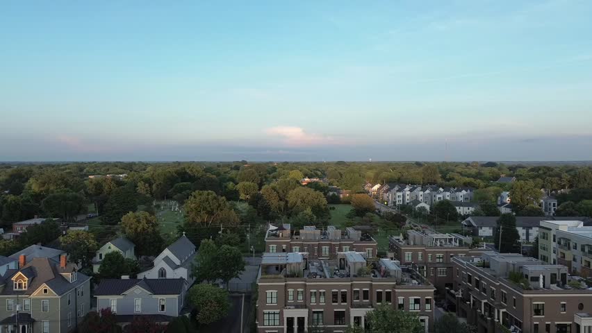 Aerial flyover shot of homes and condos in downtown Raleigh